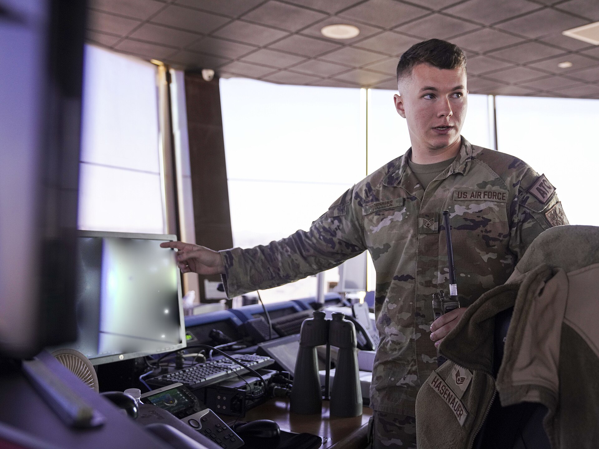 File photo of a U.S. Air Force controller demonstrating air traffic control equipment in January 2025. Illustrative context; not the reported event.
